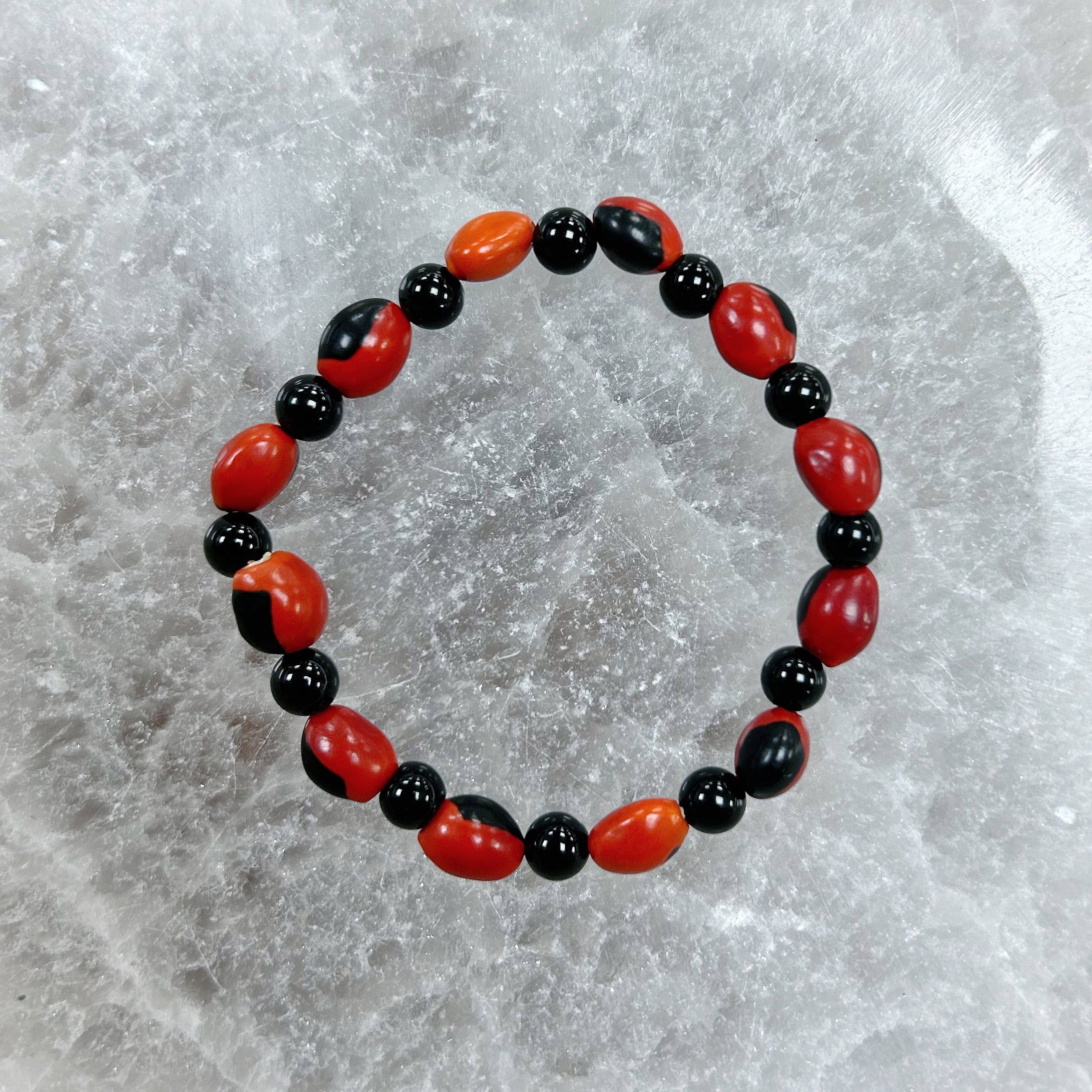 Onyx and Male Huayruro Bracelet 11mm