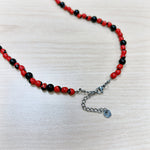 Load image into Gallery viewer, Huayruro and Onyx Adjustable Beaded Necklace 4mm - Stainless Steel
