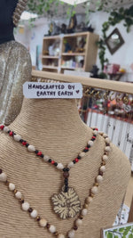 Load and play video in Gallery viewer, Sacred Ayahuasca with Açaí and San Pedro Seeds - Long Necklace
