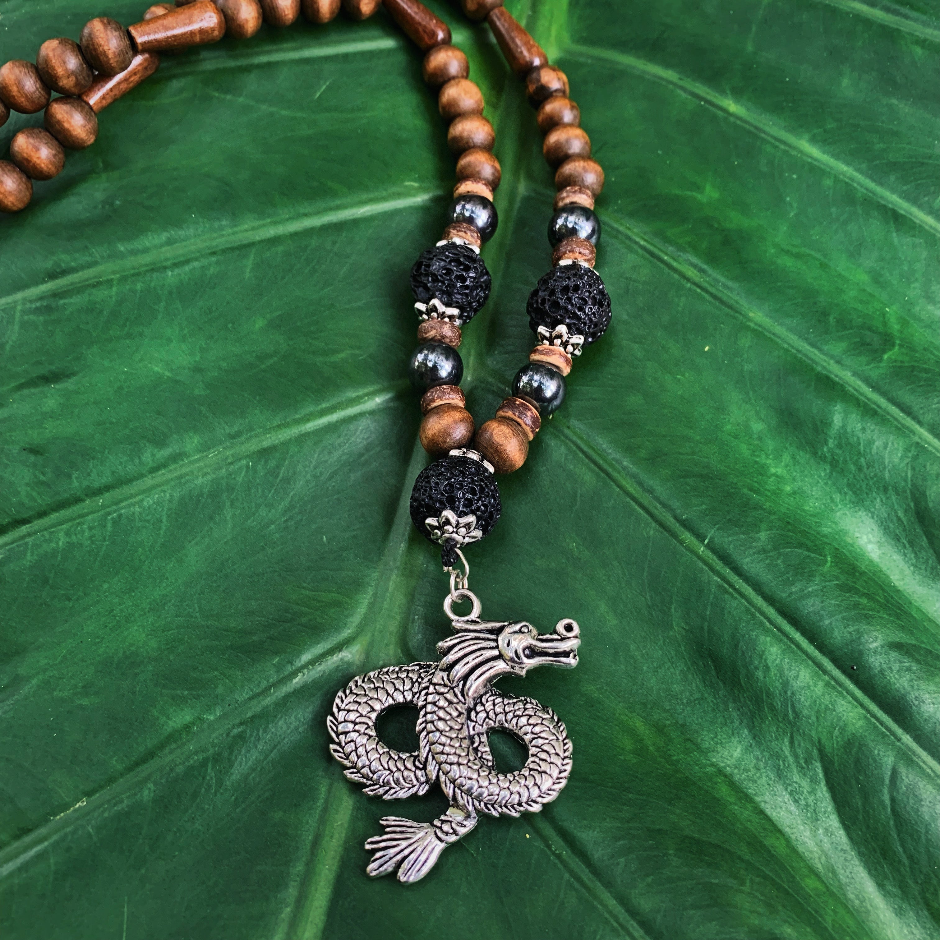 Wood, Hematite, Lava, and Dragon Necklace