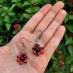 Load image into Gallery viewer, Small Huayruro &amp; Onyx Flower Earrings - Stainless Steel
